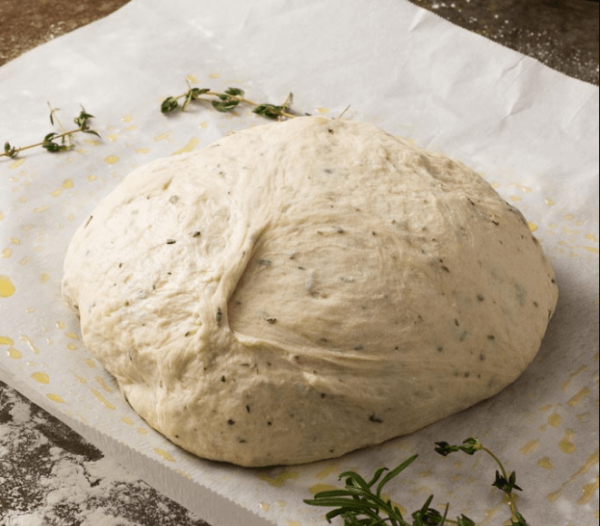 Add some water to the mixture & knead it into a soft dough.