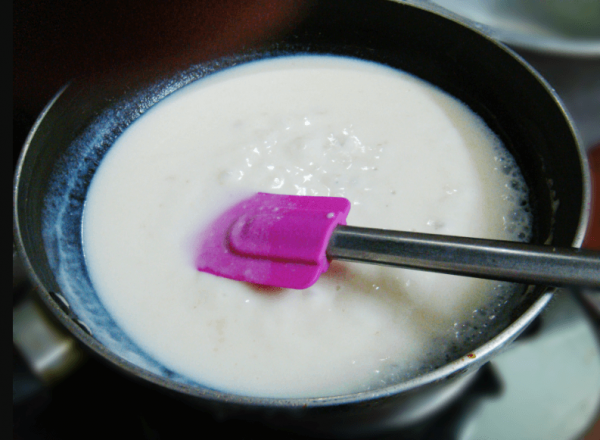 Gradually stir in the milk to get a smooth sauce