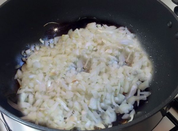 add chopped onion to wok