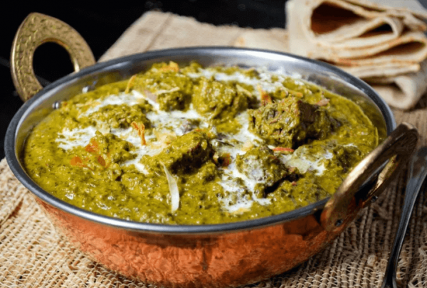 Serve Palak Gosht with Naan